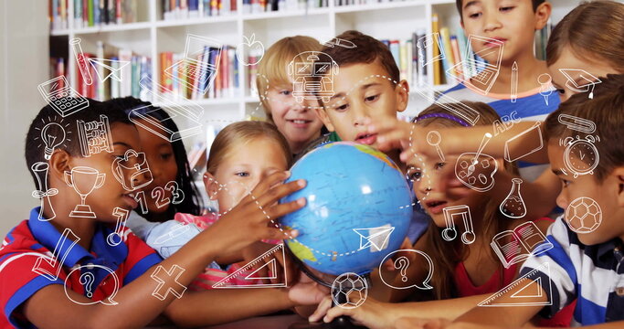 Students rotating blue globe on wooden table in school library with doodle icons overlay