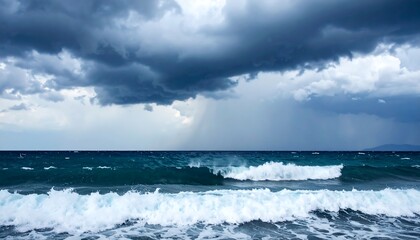 Fototapeta premium Dramatic seascape with stormy clouds over the ocean and crashing waves