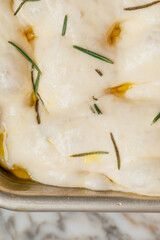 raw rosemary focaccia dough
