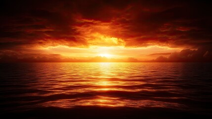Obraz premium Dramatic sunset over the ocean with fiery clouds creating a breathtaking horizon view showcasing