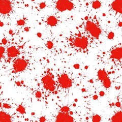 Vibrant red blood splatters against a clean surface, creating a visually striking and intense image