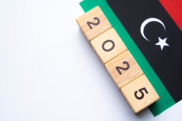 2025, Libya Flag with date block, Concept, Important events for Libya the new year, election,...