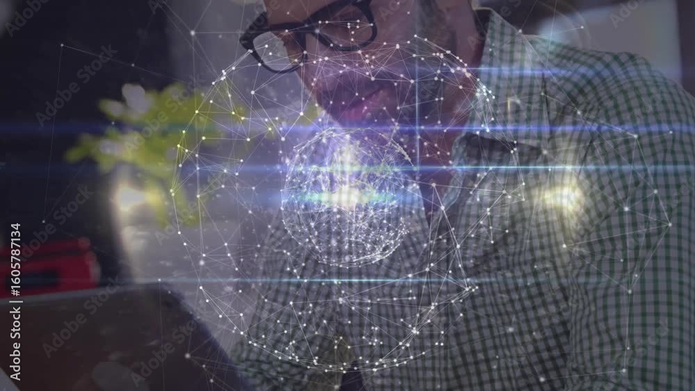 Poster tech designer focusing on laptop activating holographic network globe while studying data on tablet