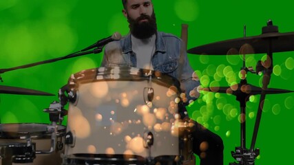 Glowing bokeh overlay activating bearded drummer tapping tom and ride cymbal for music recording