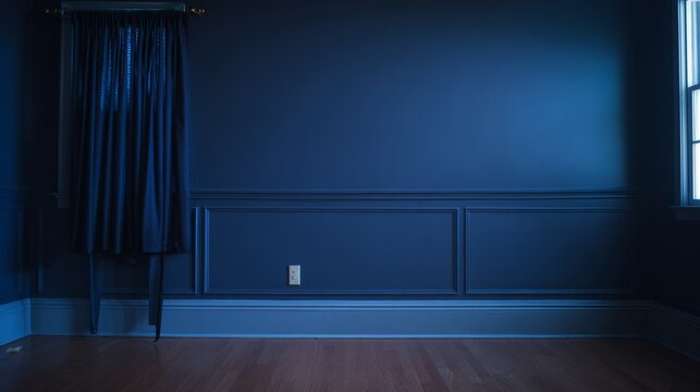 Empty dark blue room with wooden floor and curtain by the window.