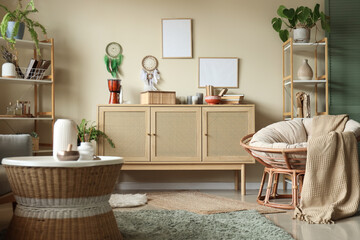 Interior of living room with witch's magic attributes, commode and frames