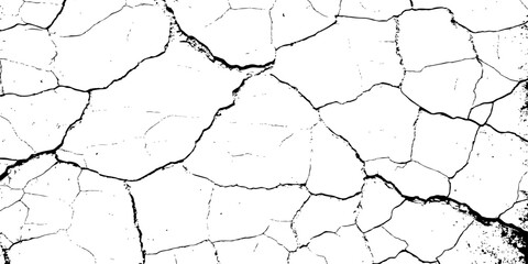 white surface with a network of black cracks across the surface area.