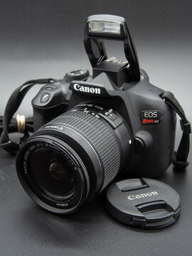 Zapopan Jalisco, Mexico - July 23, 2025: Canon EOS Rebel T6 DSLR reflex camera with lens cap, camera concept