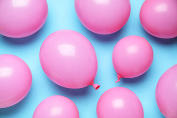Pink air balloons on blue background