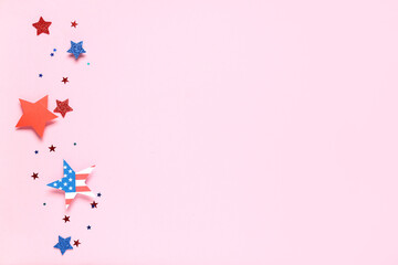 Paper stars in colors of USA flag for Independence Day on pink background