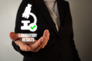 Person holding a virtual icon of a microscope with a check mark and the phrase 