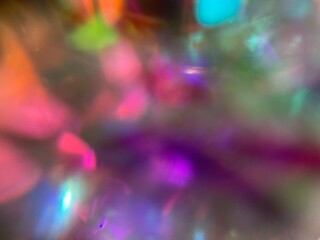 abstract background with colorful lights jewelry crystal diamond sparkles texture 