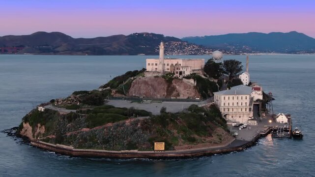 Alcatraz Island, USA, at dusk. The former prison is now a popular tourist destination. Visitors explore the island to learn about its history and infamous inmates.