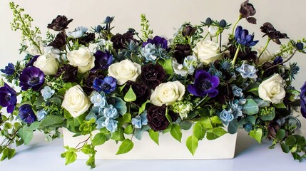Vibrant floral arrangement captured from above on a clean white surface.