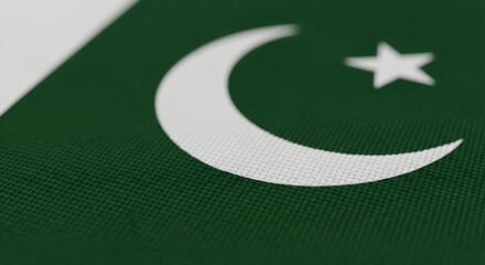 Obraz premium A closeup of the pakistani flag featuring a white crescent moon and star on a green field