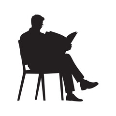Silhouette of a Man Sitting and Reading a Newspaper