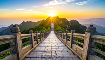 Fototapeta premium Spectacular Mountain Scenery: A scenic stone path leads to a majestic mountain under a beautiful sunrise, evoking a sense of journey and exploration.