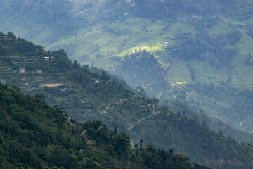 Sun rays falling on Himalayan mountain range, scenic beauty of layers of mountains, Okhrey, sikkim, India. Okhrey village a remote place in Sikkim where mountain range view is enjoyed by tourists.