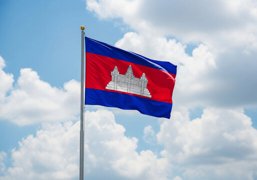 Cambodian flag flying against a bright blue sky, representing the nation’s pride