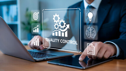 Business professional analyzes quality control data on tablet screen