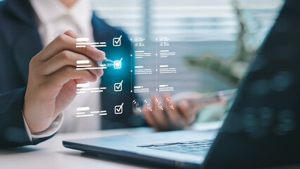 Businessman checking virtual checklists on digital interface. Concept of task management, digital...