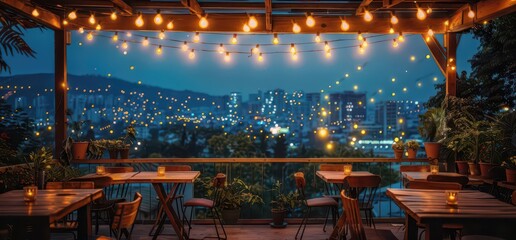 Fototapeta premium A cozy evening scene with string lights and city views, perfect for relaxation and dining.