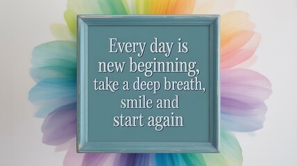 Inspirational quote in a teal frame with rainbow background