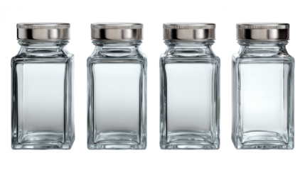 Four of clear glass bottles with silver lids, a versatile storage and display solution for modern homes.