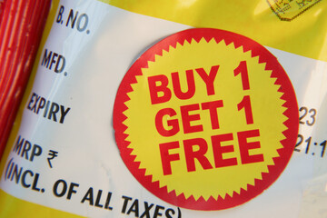 Special offer sticker on product package at grocery store