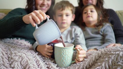 Pouring hot chocolate for kids - Powered by Adobe
