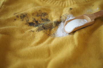 Effective cleaning method for stains on yellow fabric