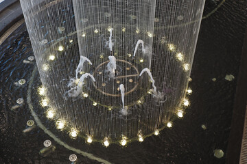 Beautiful indoor fountain with night-lit jets