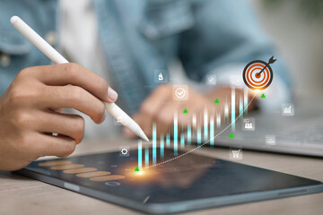Business Growth Analytics with Target Icon and Increasing Chart on Tablet