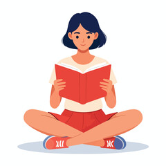 A young woman sits cross-legged, engrossed in reading a book.