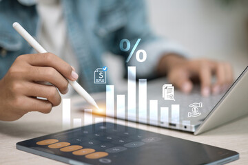 Digital Financial Analysis with Bar Graph and Percentage Icon on Tablet