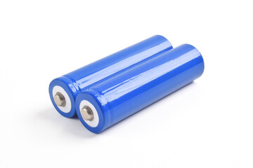 Two blue AA size batteries isolated on white backgraound