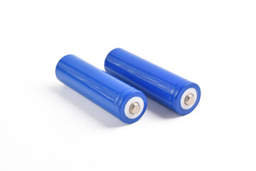 Two blue AA size batteries isolated on white backgraound