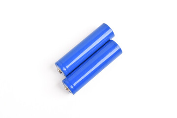 Two blue AA size batteries isolated on white backgraound