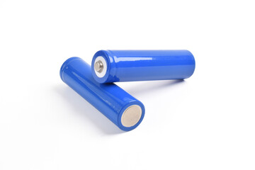 Two blue AA size batteries isolated on white backgraound