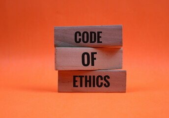 Code of Ethics Blocks on a Orange Background for Professional Concepts