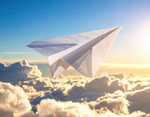 Fototapeta premium ** A paper airplane glides above fluffy clouds during sunset, capturing a sense of freedom and imagination. **