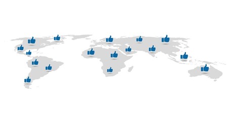 World map design where various blue web thumbs-up icons emerge around the world. - Powered by Adobe