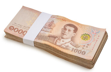 Stacks of Thai thousand-baht banknotes isolated on white background with clipping path. Ideal for concepts of business, trade, finance, investment, corruption, or economic exchange.