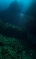 Underwater photograpy of mountain and dramatic landscape. From a scuba dive at Chumphon marine park in Thailand.