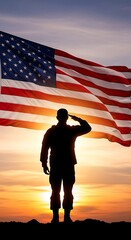 Silhouette of a soldier saluting the american flag at sunset.