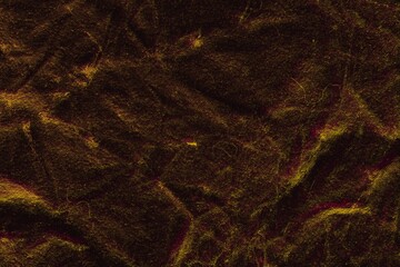 Dark Crumpled Fabric Texture with Gold and Maroon Tones