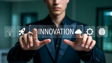Young businessman interacting with a futuristic holographic interface displaying the word innovation and various technology icons