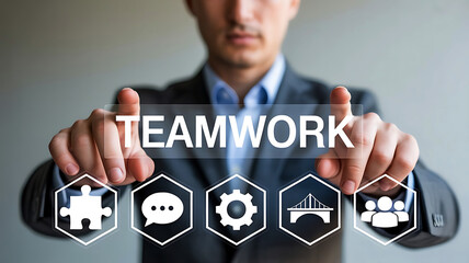 Businessman interacting with digital interface displaying teamwork concept and collaborative business icons on screen