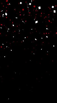 Falling explotion shiny red and white confetti isolated on transparent video black vertical background. Bright festive tinsel of black color.