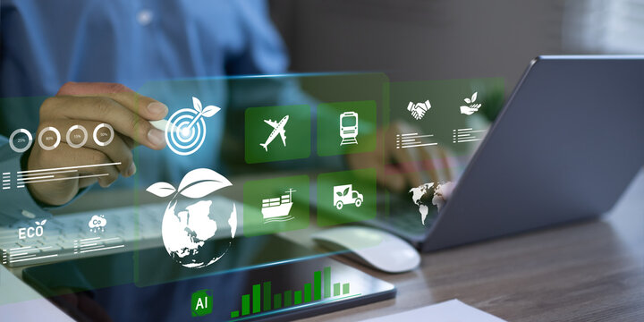 Global transportation concept, businessman using notebook for transportation, green energy, sustainable development and environmentally friendly global transportation.